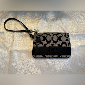 EUC Coach wristlet with stripe